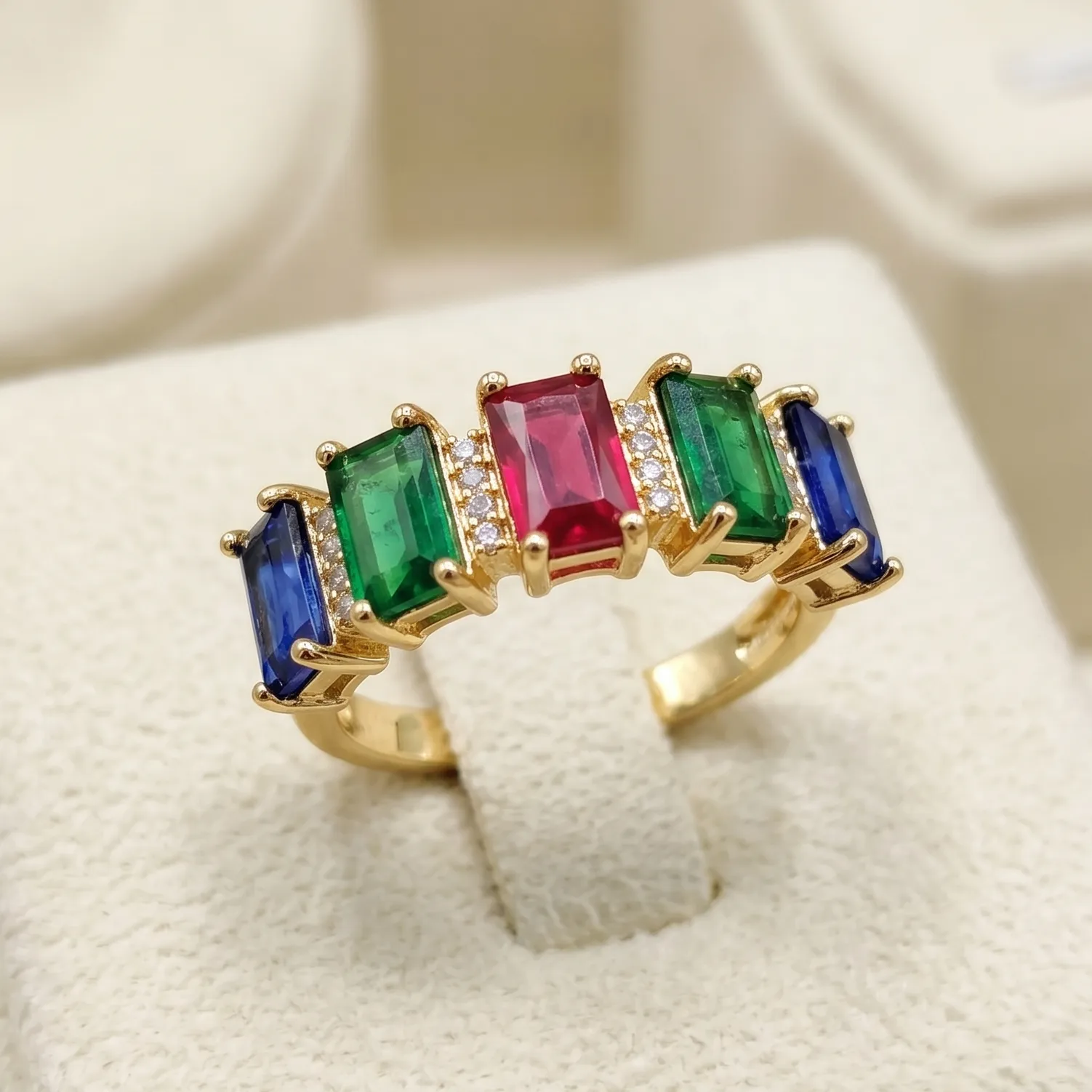 vibrant gold ring adorned with colorful gemstones,