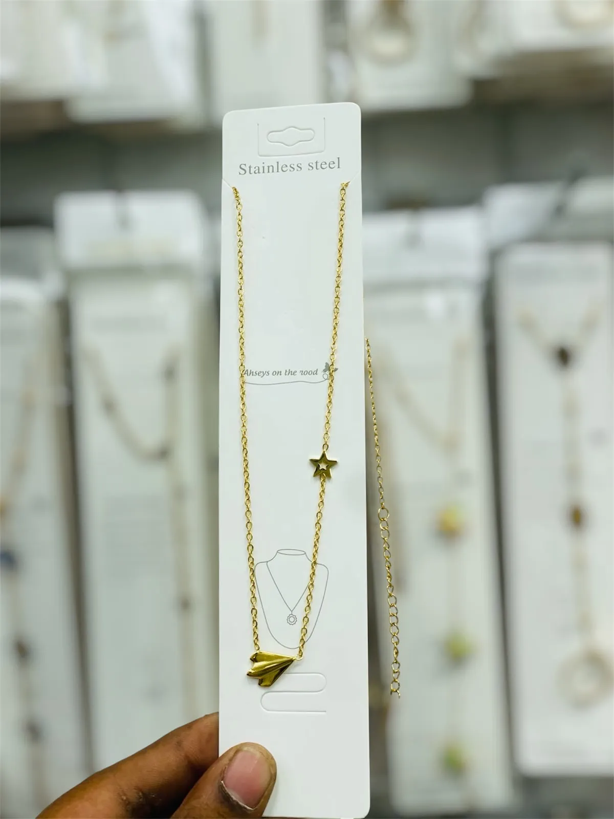 Anti-tarnish paper plane and star chain necklace
